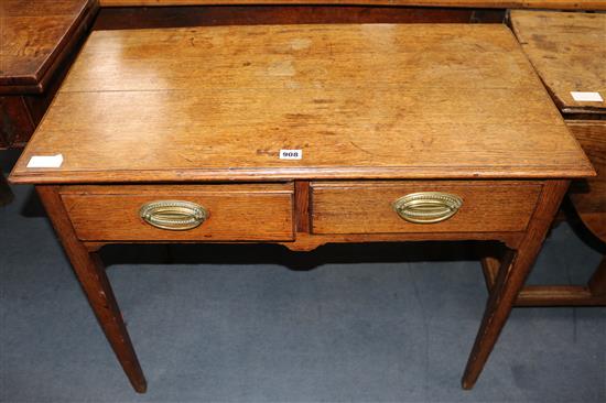A George III oak hall table, with two drawers W.86cm